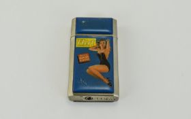 Next Flirt Chrome Windproof Gas Lighter. With Picture of Bathing Beauty in Swimsuit to Front of