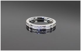 18 Carat White Gold Diamond Eternity Ring channel set princess cut diamond. Stamped 750.