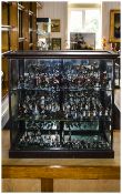 Fine Display Cabinet of Military Figures, the hand painted cabinet with open glass shelves,