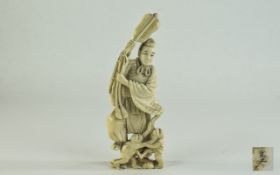 Japanese -Fine and Late 19th Century Signed Carved Ivory Figure - Japanese Male Figure Holding a