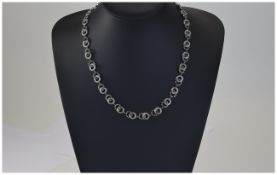 9ct White Gold Diamond Necklace interlocking ring links set with round cut black and white diamonds,