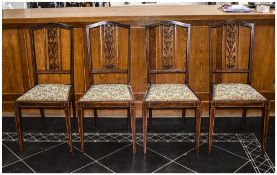 Set of Four Edwardian Chairs, carved splat, square tapering front legs. With padded floral seats.