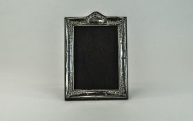 George V Silver Photo Frame, Mahogany Back, Chester Hallmark for 1914. Size 7.25 x 5 Inches.