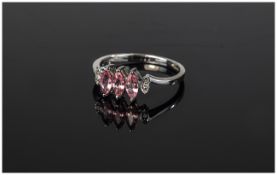 A 9ct White Gold Dress Ring Set with 3 Pink Sapphires of Good Colour. Fully Hallmarked.