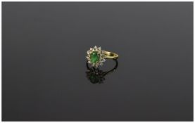 18 Carat Gold Diamond and Emerald Cluster Ring central emerald surrounded by round cut diamonds Est