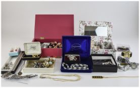 Large Box containing an assortment of costume jewellery, including pendants, bracelets,