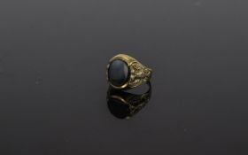 A Gents 9ct Gold Stone Set Ring, with Embossed Image of a Double Headed Eagle to Shoulder of Ring.