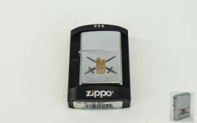 Zippo- Windproof Chrome Lighter With British Army Crest To Front Of Lighter. Made In USA.