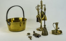Small Collection of Brass comprising chamber stick, fireside irons,