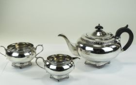 George V Heavy and Good Quality Silver 3 Piece Tea Service with Stylised Borders and Feet. Maker E.