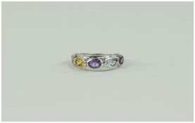 Multi Gem Five Stone Band Ring, oval cuts of amethyst, sky blue topaz, rhodolite garnet, citrine and