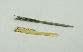 Two Letter Openers comprising carved bone and silver handles