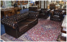 Traditional Brown Leather Three Piece Chesterfield Suite Comprising A Three Seater Sofa And Two Tub