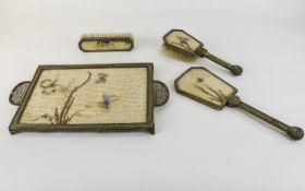 1930's Dressing Table Set gilt metal comprising tray, two brushes and hand mirror,