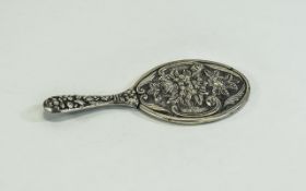Miniature Embossed White Metal Hand Mirror floral scroll and embosses back. Looks to be silver.