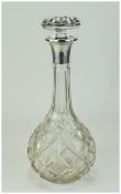 A Silver Collared Cut Glass Decanter, Ni