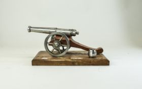 Cast Model Of A Cannon On Wooden Base, 9