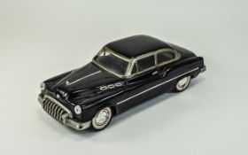 A Model Tinplate Toy Car of a 1950's Bui