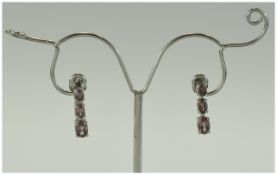 Malaya Garnet Drop Earrings, each compri