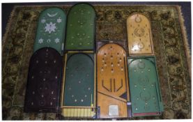 A Collection of 9 Table Top Bagatelle Ga