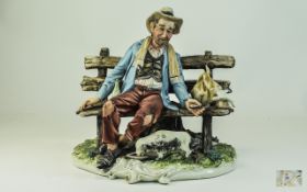 Capodimonte Domenico Polonisto Limited Edition Figure, showing a tramp on a bench surrounded by