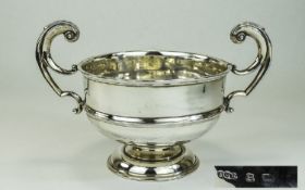 George V Twin Handle Silver Trophy Footed Bowl With Shell Handles.