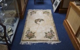 Rectangular Wool Rug With Floral Decoration.