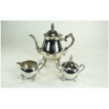 Silver Plated Three Piece Tea Set, Comprising Teapot, Cream And Lidded Sugar