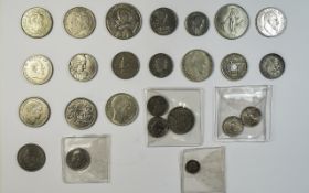 A Collection Of World Silver Coins. A lot of coins in high grade condition. See photo.