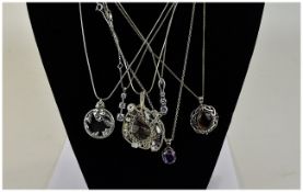 Collection of 6 Silver Pendants and Chains set with coloured stones and abalone shell.