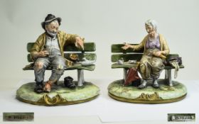 Pair of Capodimonte Glazed Figures of a Tramp Couple, each signed B.Merli; the dishevelled