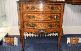 A Louis XV Style Kingwood and Ormolu Mounted Serpentine Front Bombe Commode, Inlaid with Marquerty