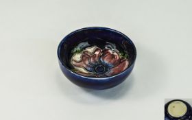 Moorcroft Tube lined Small Footed Bowl ' Clematis ' Design on Blue Ground. 3.25 Inches Diameter.