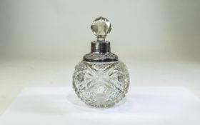 Edwardian Heavy and Ornate Silver Collared Cut Glass Globular Shaped Perfume Bottle.