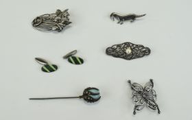 Collection of Jewellery comprising brooches, cufflinks, stick pin etc all in white metal.