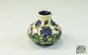 Moorcroft Miniature Tube lined Globular Shaped Vase ' Floral ' Design on Cream Ground. 2.