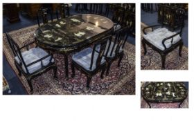A Wonderful Black Lacquered Dining Table,