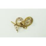 18ct Yellow Gold Stylish Brooch From The 1950's, Set with Rubies ( 9 ) In Total.