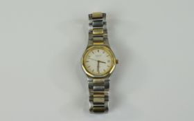 Gents Tissot Wristwatch, white dial, gilt baton numerals with date aperture.