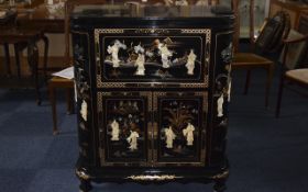 A Wonderful Black Lacquered - Combined Drinks Cabinet and Chest,