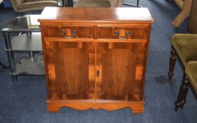 Modern Reproduction Sideboard. With cupboard space below 2 draws.