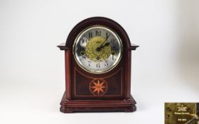 Franz Hermle Mahogany Cased and Inlaid Mantel Clock, 2 Jewels, Unadjusted.