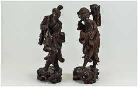 Pair of Similar 1920's Japanese Rosewood Carved Figures. One Is a Fisherman with bone detail to