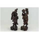 Pair of Similar 1920's Japanese Rosewood Carved Figures. One Is a Fisherman with bone detail to