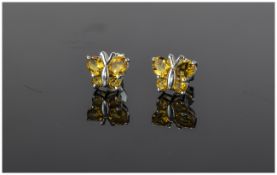 Citrine Butterfly Stud Earrings, two oval and two round cut citrines representing the wings of the