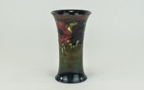 William Moorcroft Signed Vase 'Anemone' Design under a flambe glaze. Circa 1954. 6.25 inches high.