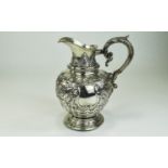 European Mid 19th Century Very Impressive Embossed Silver Jug. Highly Decorative To All Parts Of The
