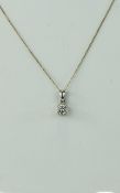 Ladies 9ct White Gold Set Single Stone Round Brilliant Cut Diamond Pendant Attached to a 9ct Gold