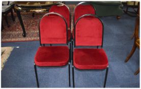 Set of 4 Conference Chairs With red upholstery with a black metal frame