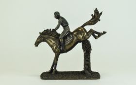 Bronzed Resin Sculpture Of a Horse And Jockey Height 10 Inches.